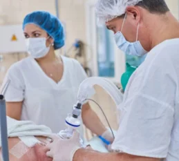 A doctor performing surgery on a patient, focusing on precision and critical medical care.
