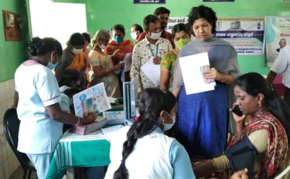 A queue of sick people waiting to receive medical examinations at a medical camp in kovundampalayam
